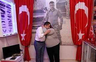 ALKÜ Rektörü Türkdoğan, şehit ailesiyle bir...