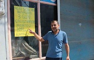 Basra sıcakları dükkan kapattırdı