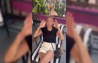 Cumhurbaşkanına hakaret eden kadını cep telefonuyla...