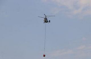 Dün yangının çıktığı ormanda soğutma çalışmaları...