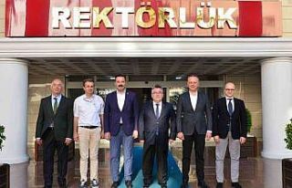 Alan ve Çağlayan’dan Rektör Özölçer’e ziyaret