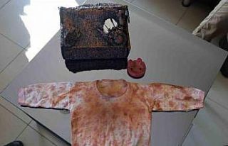 Depremzedeye ait olduğu düşünülen kanlı çocuk...