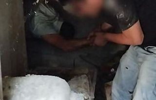 Cezaevi firarisi bidonların arasında yakalandı