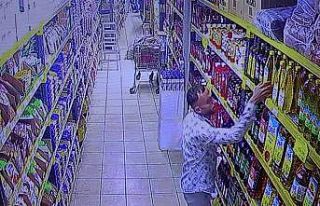 Ayçiçek yağını pantolonunun içine sokarak çaldı