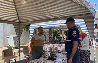 Jandarma sahte para konusunda esnafı bilgilendirdi
