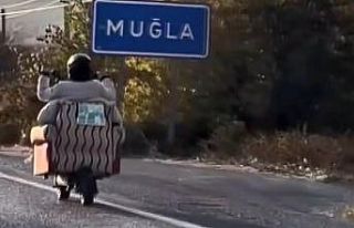 Scooter’a yerleştirdiği koltukla trafiğe çıktı
