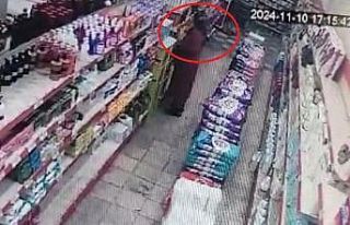 Temizlik malzemesi çalan kadın kameraya yansıdı