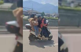 Bursa’da motosiklete 5 kişi binen aile yürekleri...