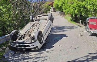 Ters dönen otomobilden yara almadan kurtuldu