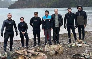 Yağmur altında deniz dibi temizliği