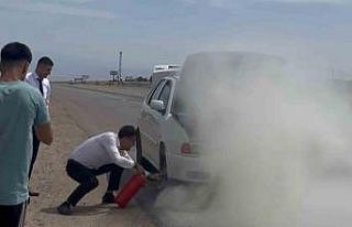 Yanan otomobile çevreden geçen otobüs şoförleri...