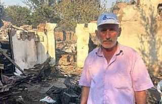 Evini yanmaktan su hortumu ile kurtardı