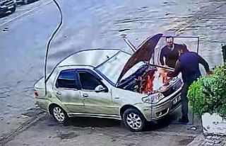 Alev alan otomobili üfleyerek söndürmeye çalıştı:...