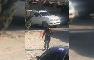 Mustafa Türkay Sonel’in silahlı ve kamuflajlı...