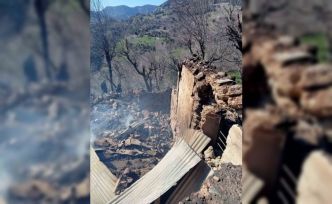 Yanan evden parasını kurtarmak isterken ağır yaralandı