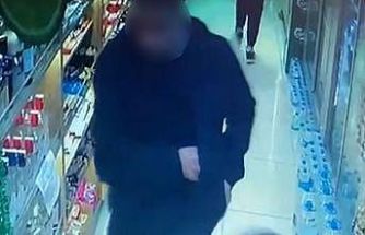 Marketten alkollü içecek çalan şahıs kameraya yakalandı