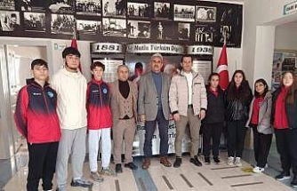 Şampiyon sporculardan anlamlı ziyaret