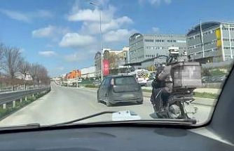 Kuryenin yardımına otomobil sürücüsü çekme halatıyla yetişti