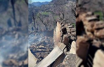 Yanan evden parasını kurtarmak isterken ağır yaralandı