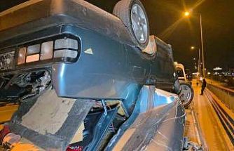 Takla atan otomobilden burunları bile kanamadan çıktılar